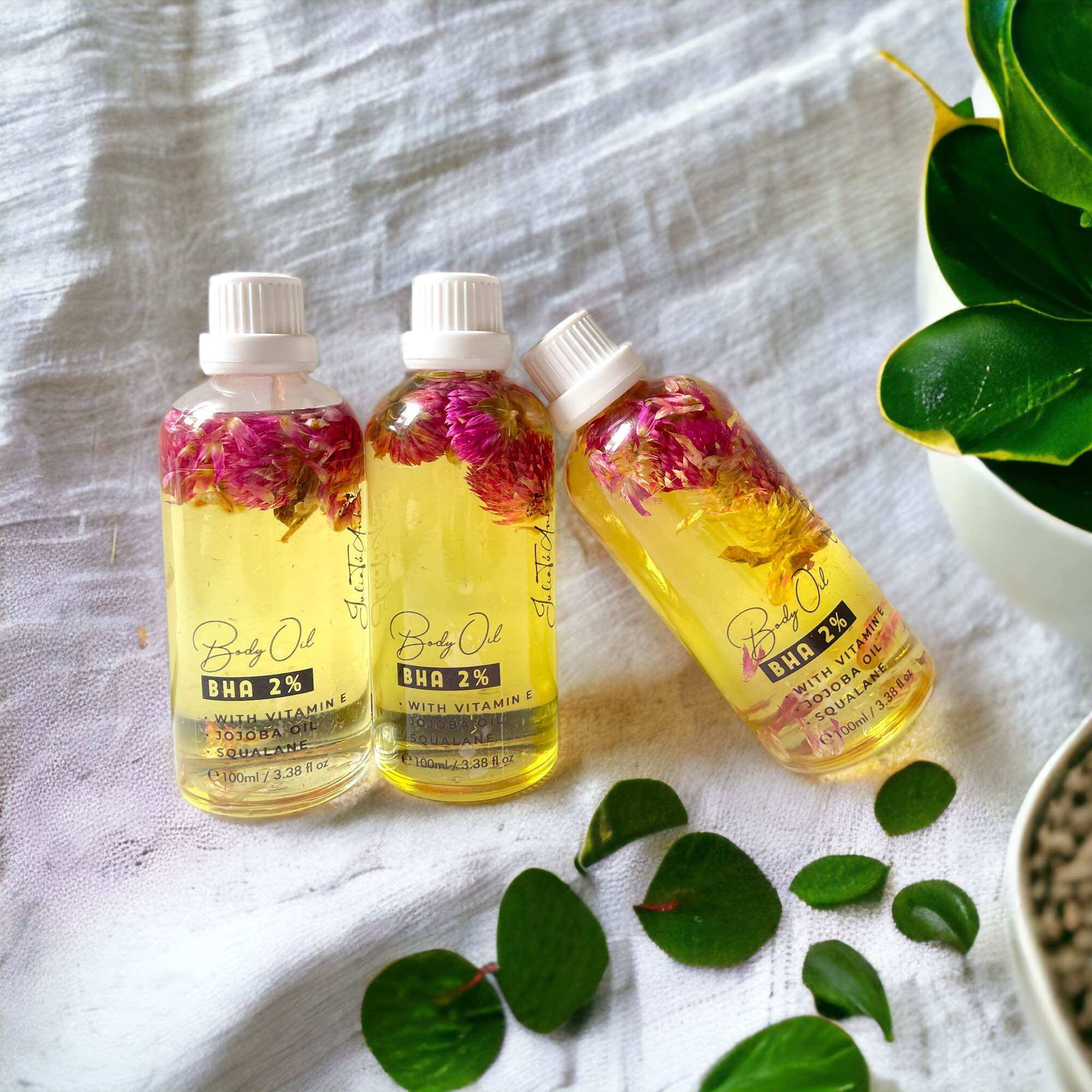 Body oil 2% bha mix cúc bách nhật