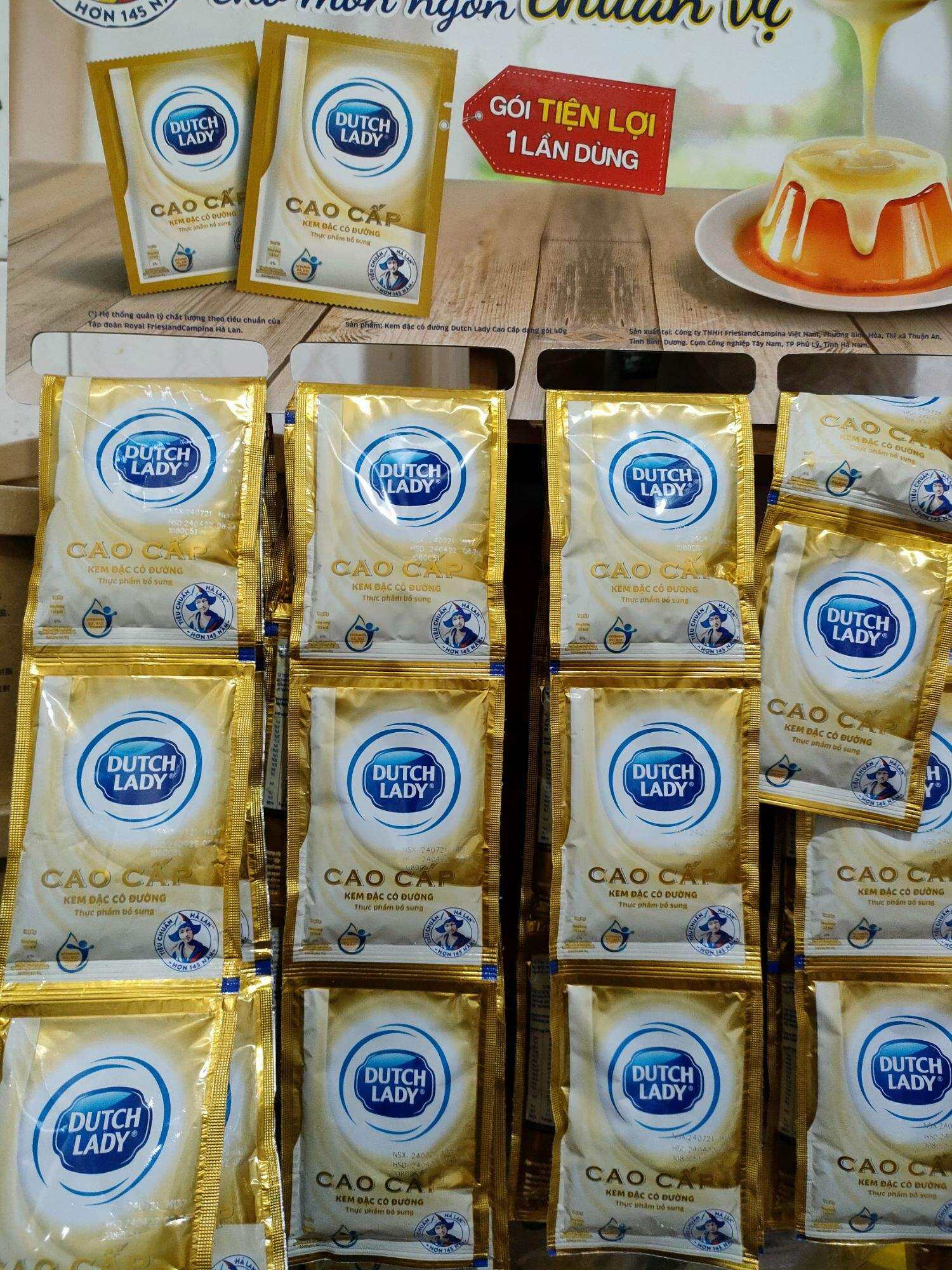 sữa đặt có đường dutchlady cao cấp. trọng lượng 40gr/gói.