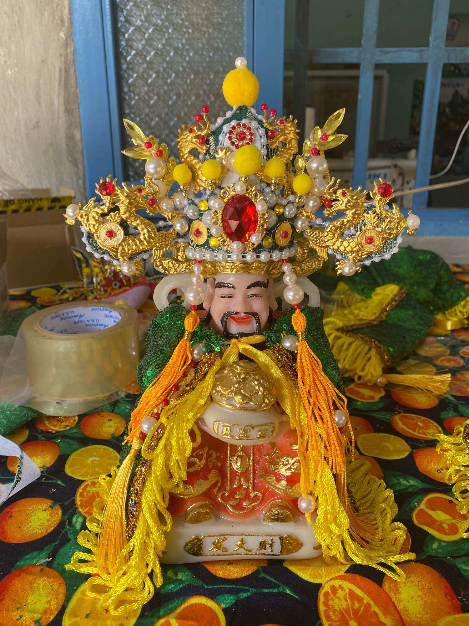 Áo mão ông thần tiền