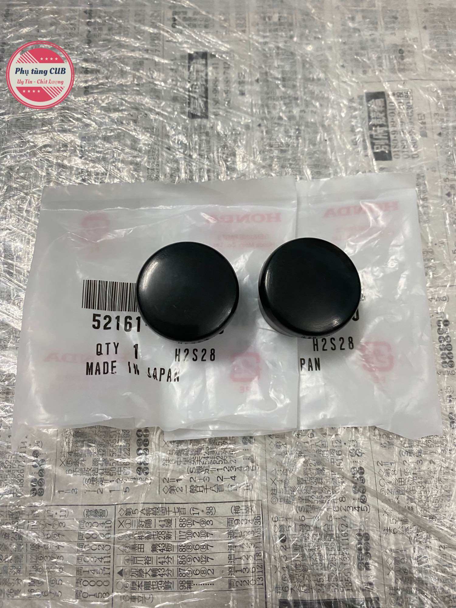 Nút chụp gắp sau xe cub màu đen hàng zin mới