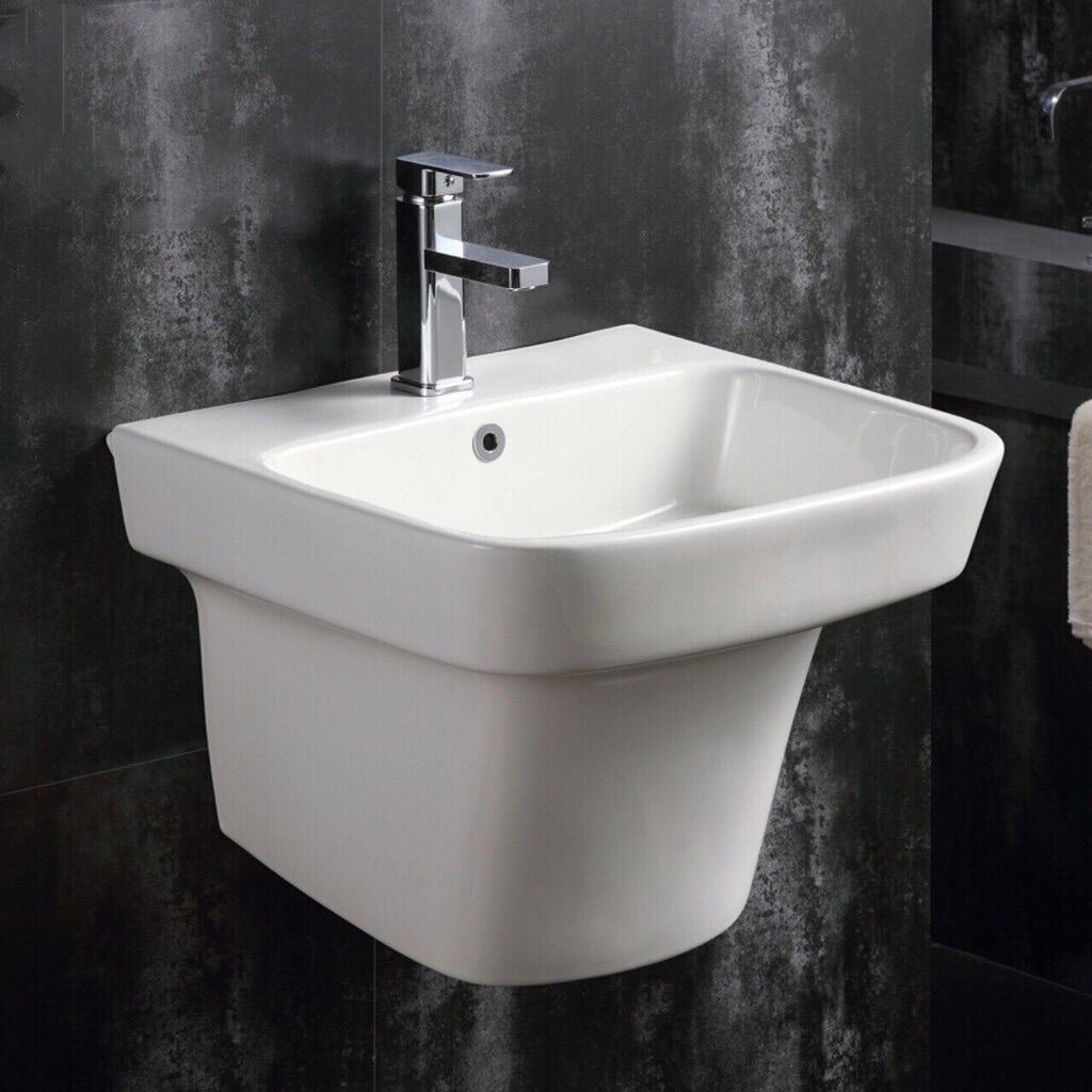 Bồn rửa mặt lavabo treo tường vuông liền khối, chậu rửa mặt vuông liền chân kèm tắc kê . Men nano mịn, bảo hành 10 năm