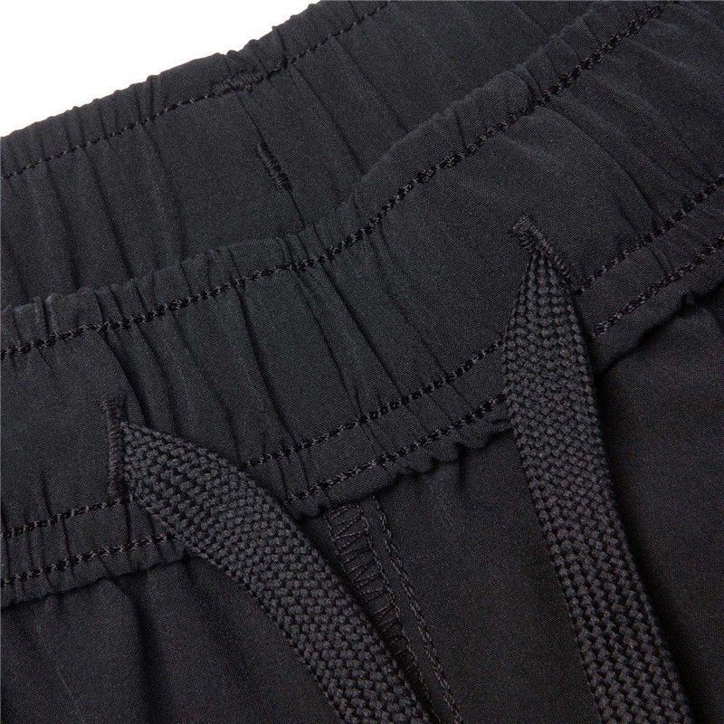 Quần gió Lining nam AKSQ099