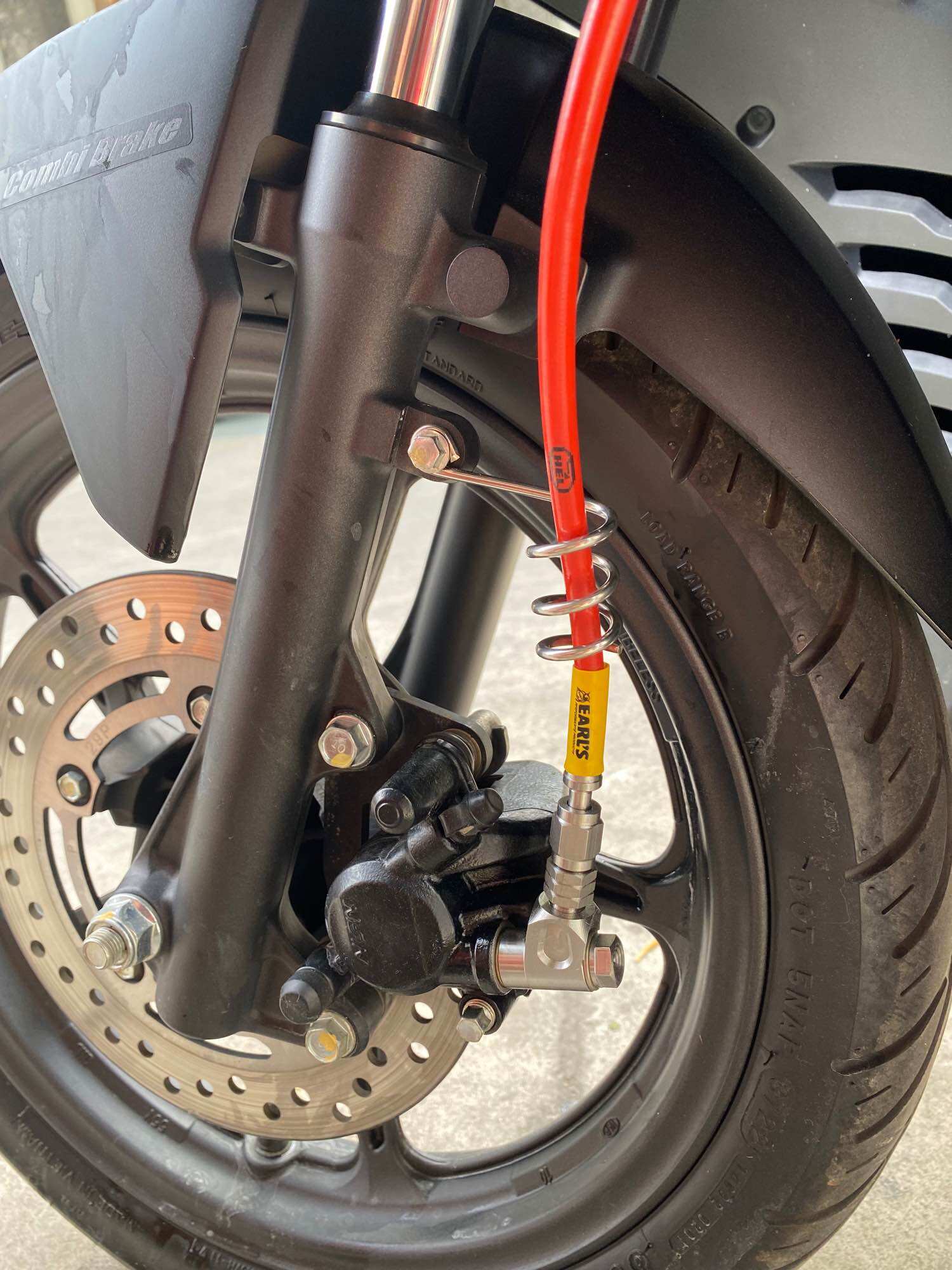 Motorcycle oil wire pad clamp