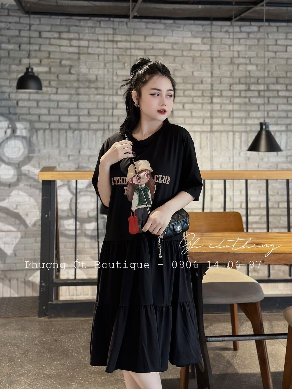 Váy cotton đen suông đuôi cá hình cô gái