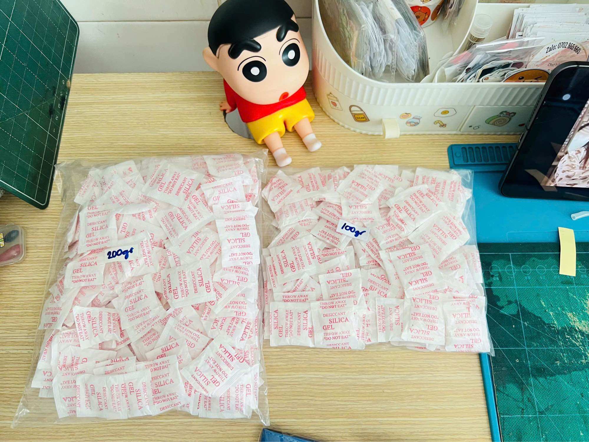 100gr gói hút ẩm- túi chống ẩm giấy (khoảng 82 gói)