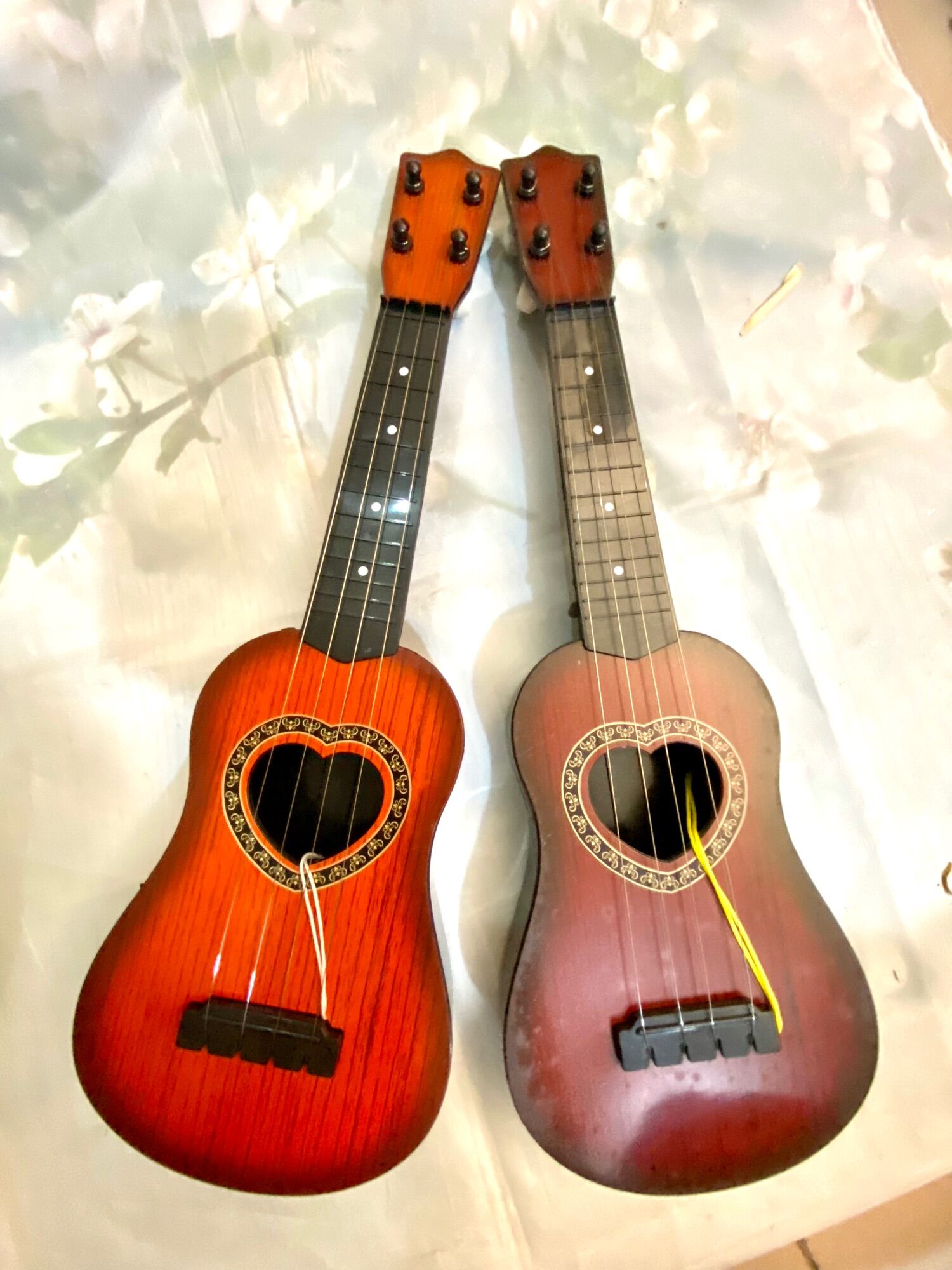 Đàn ghita nhựa giả gỗ