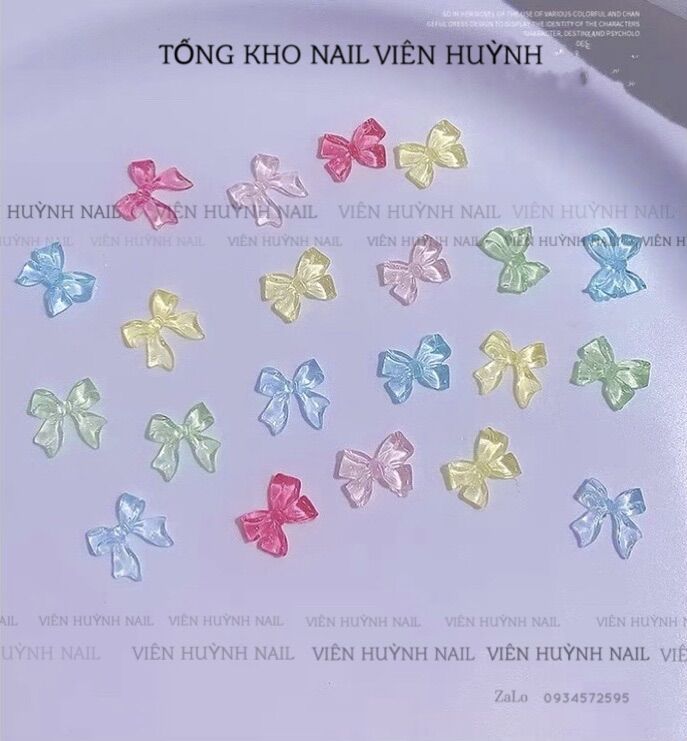 Nơ pha lê nail , set 50 cái phụ kiện gắn móng hình nơ
