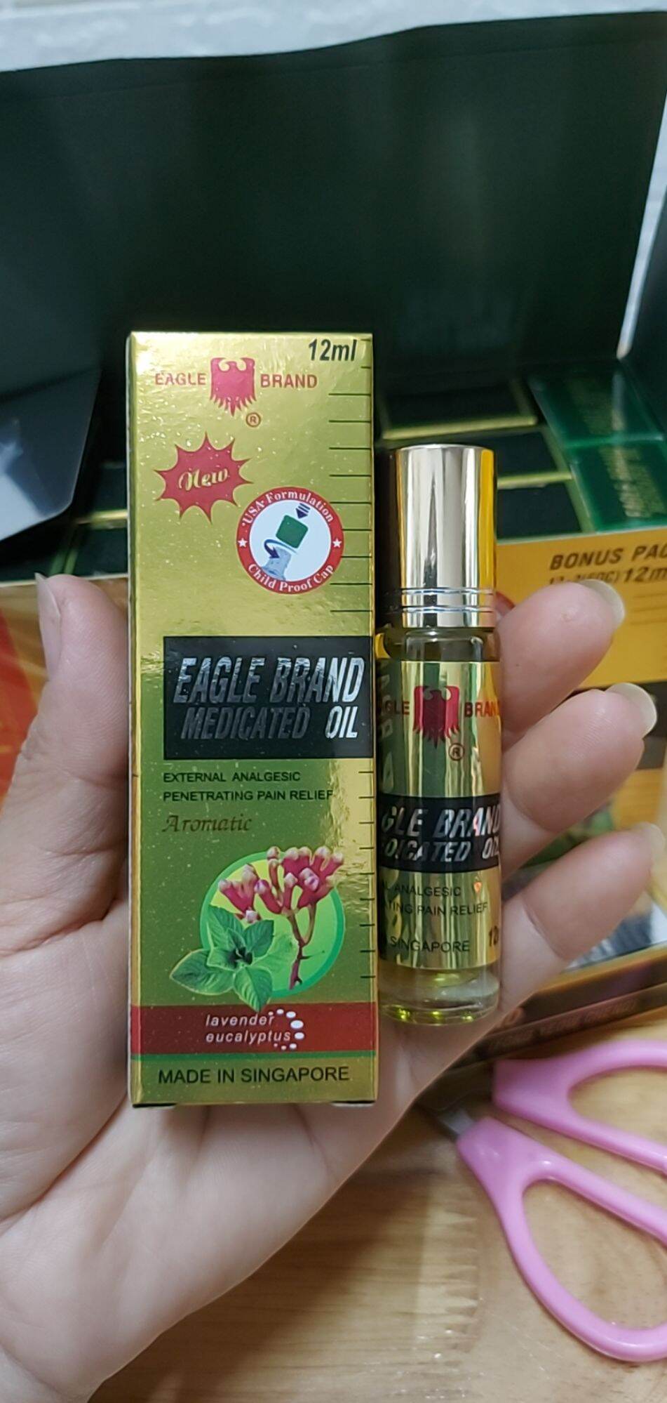 Dầu vàng singapore hiệu con ó dạng lăn mẫu mới 12ml- nội địa mỹ