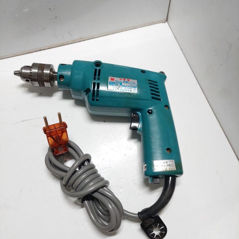 Máy khoan makita nhật đầu 10mm điện 100v