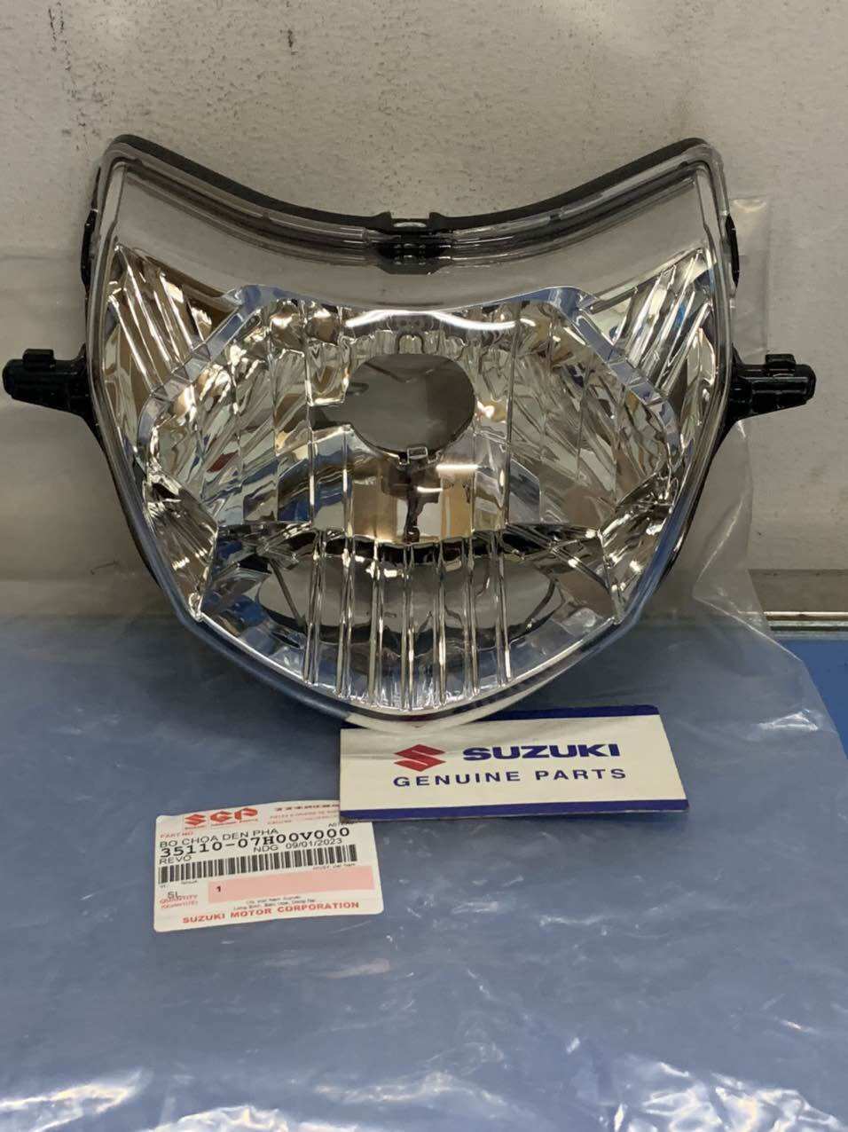 Pha đèn smash revo suzuki