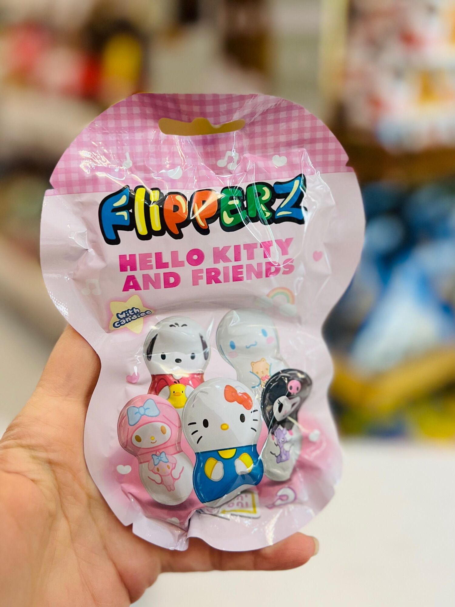 Hộp 24 gói Kẹo Đồ Chơi Lật Đật Hello Kitty Flipperz