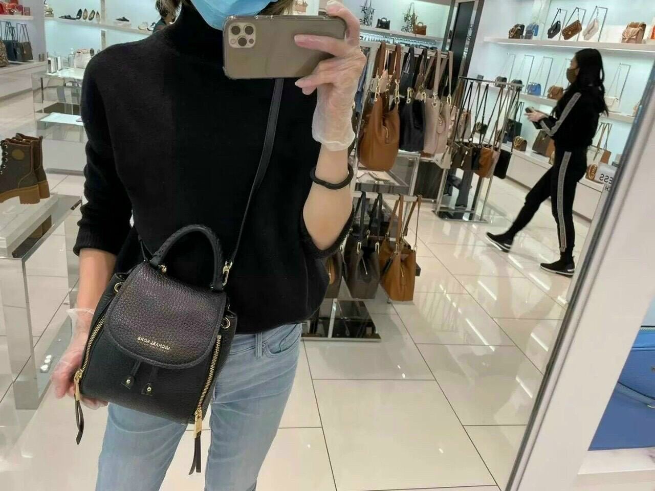 Balo MK mini dây rút 2 ngăn kéo phía trước