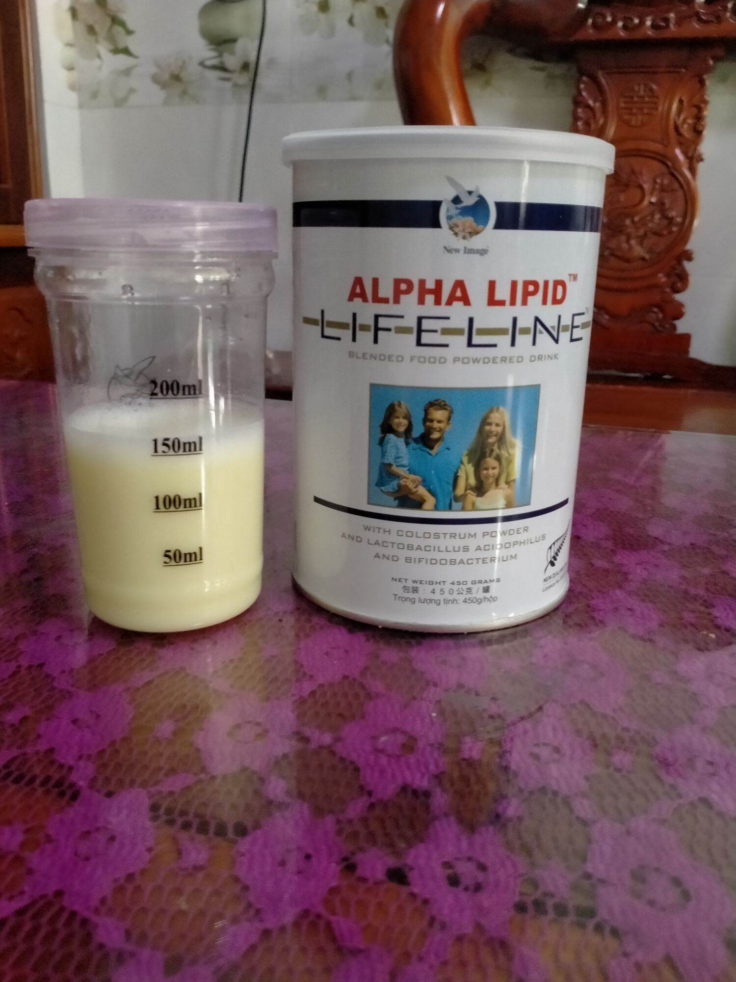 Sữa Non ALPHA LIPID LIFELINES ( Tặng Ly LẮC ) nhập khẩu 100% Từ New Zealand Sản Phẩm của công ty New Image Việt Nam ( Đ/C 4 nguyễn đình chiểu phường đa kao Q1. TPHCM ).( có kèm hóa đơn mua hàng công ty )