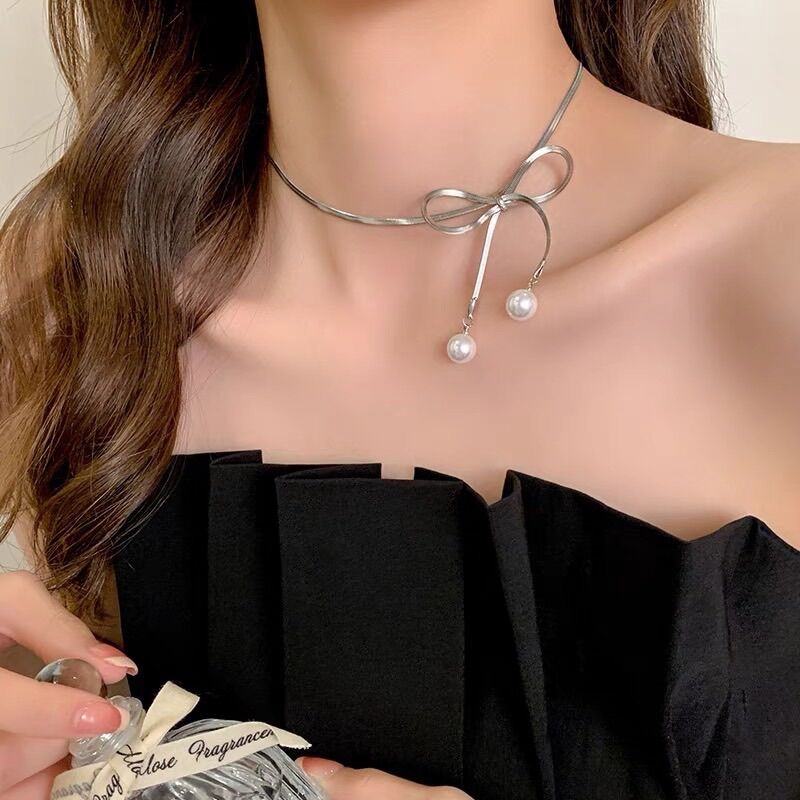Choker titan dây mảnh nơ ngọc