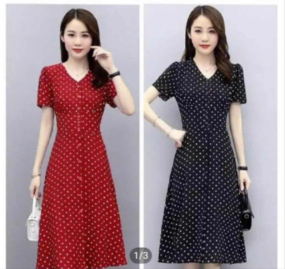 Đầm chấm bi cổ tim phối nút duyên dáng .Có size từ 38 đến 89 kg