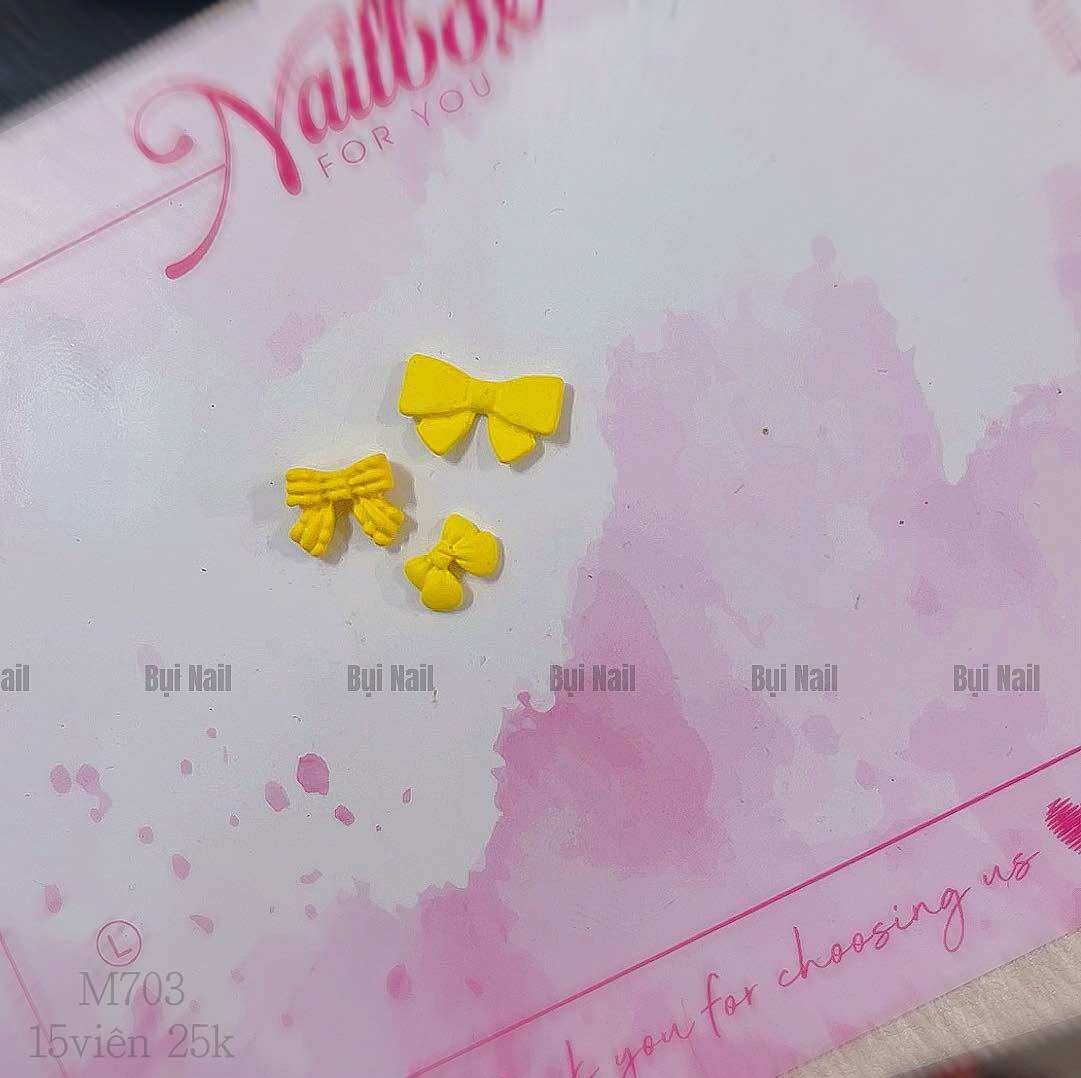 CHARM NƠ VÀNG SET 15 VIÊN M703