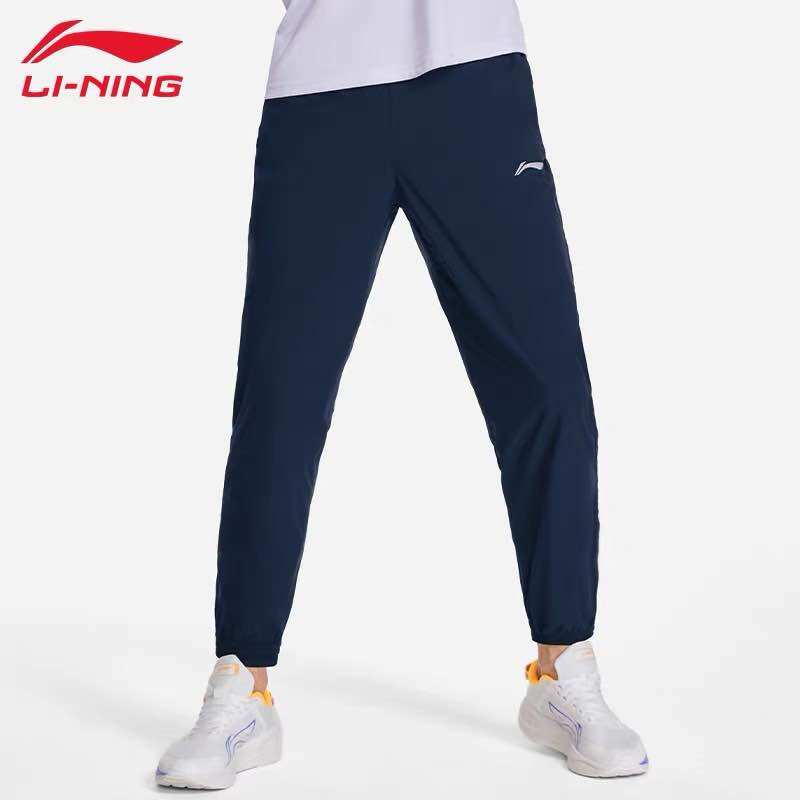 Quần gió nam lining aykr859