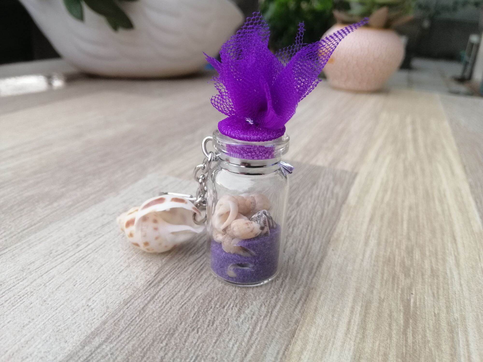 MÓC KHÓA CHAI THỦY TINH ĐỰNG ỐC SIZE 2*4 CM