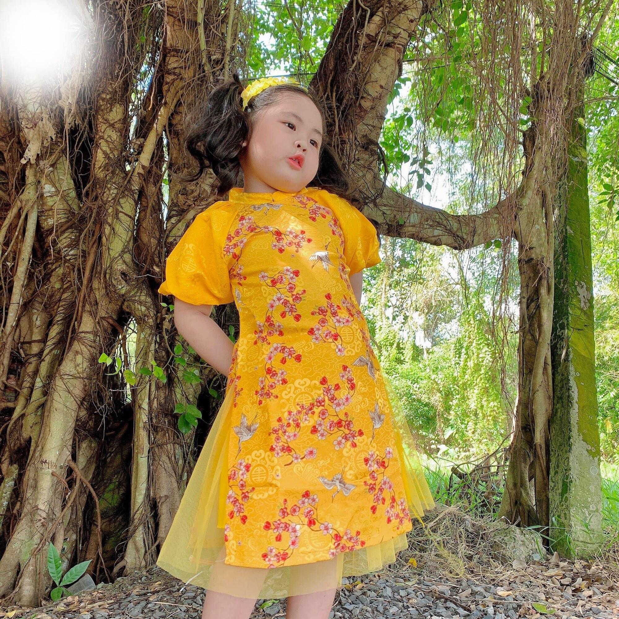 Váy cách tân size đại màu vàng cho bé 28kg đến 40kg