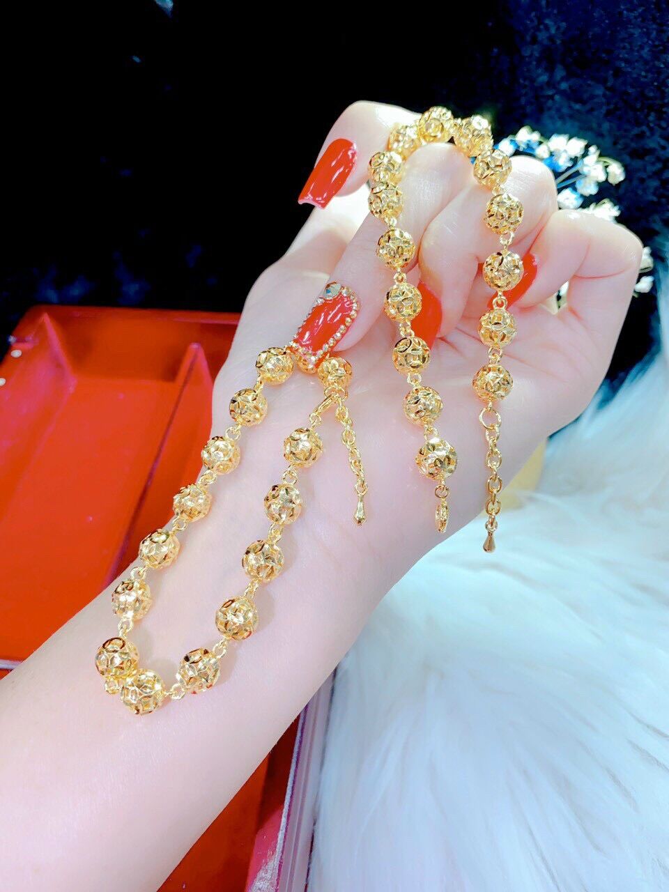 Lắc tay kiểu trái châu mạ vàng 18