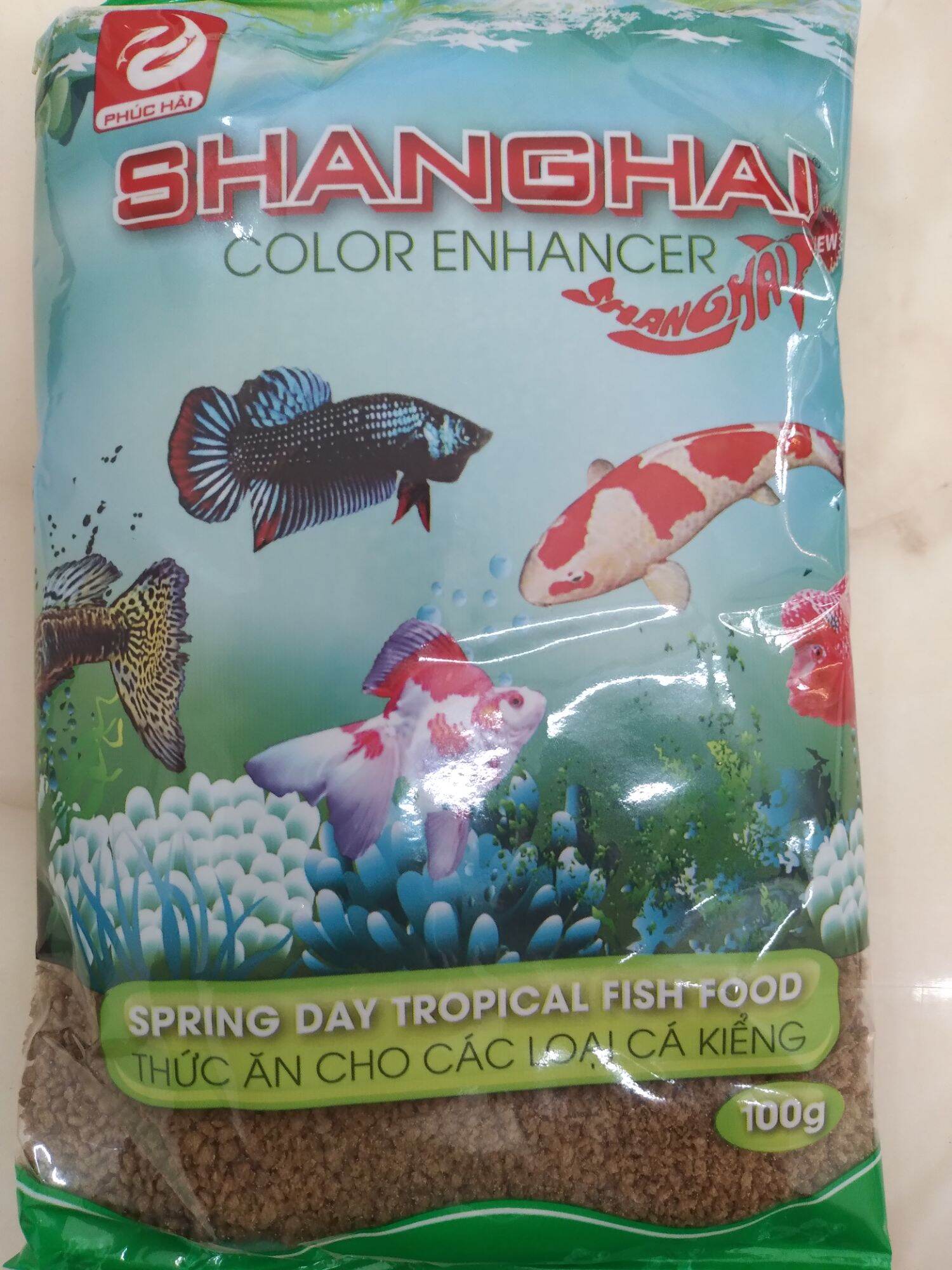 Thức ăn cho cá kiểng Shanghai 100g hạt nhỏ cho cá con