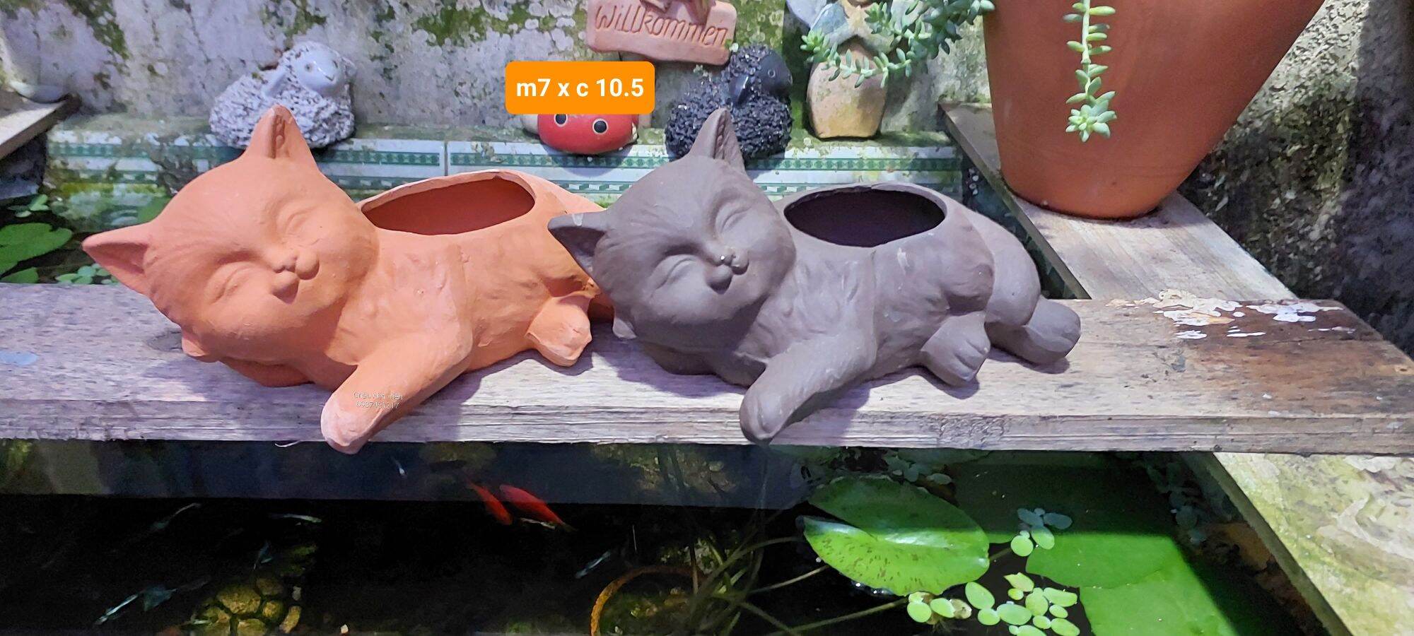 Chậu đất nung Bình Dương hình chú mèo nằm