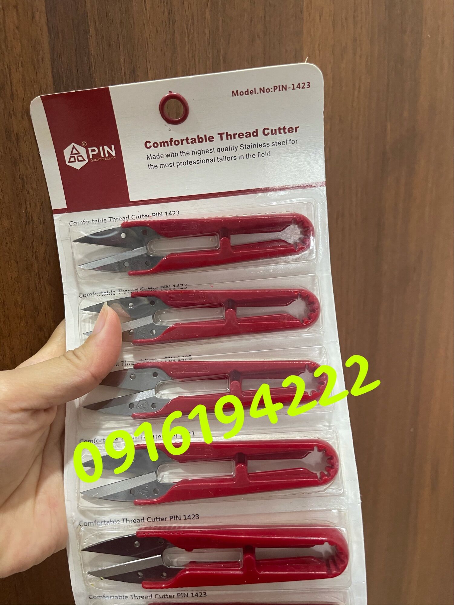 Kéo bấm chỉ lưỡi inox cán đỏ hãng pin
