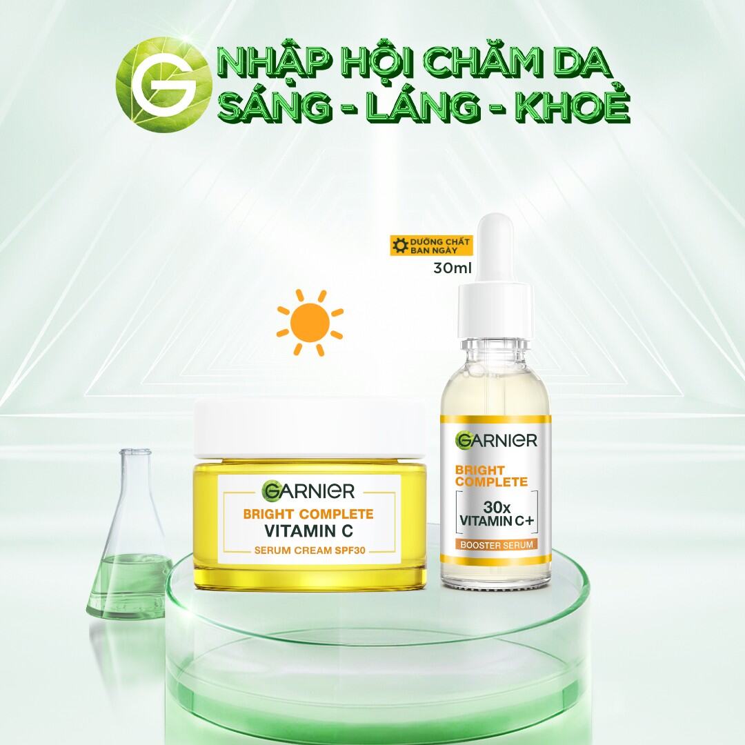 Bộ đôi tinh chất và kem dưỡng da ngày đêm làm sáng đều màu da chỉ từ 3 ngày Garnier Bright Complete 30X Vitamin C Booster Serum (30ml x 18ml x 18ml)