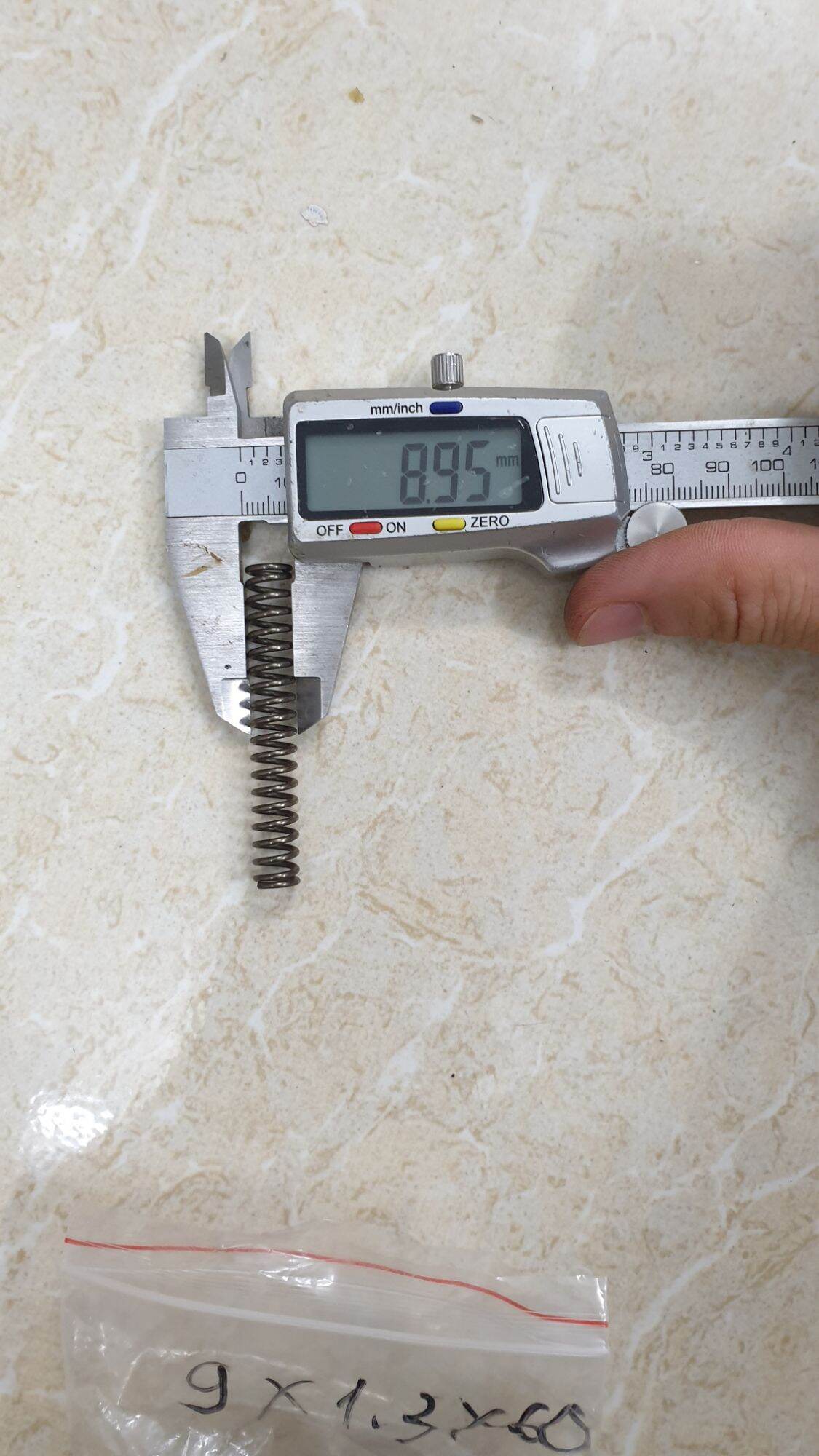 Lò xo phi 9 sợi 1.3 dài 6cm