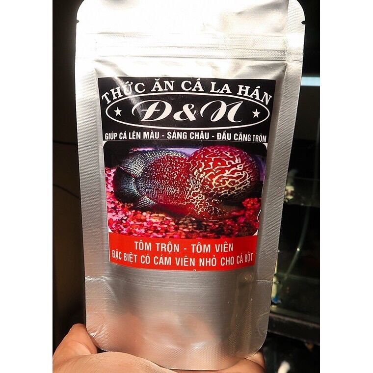 Thức ăn cá la hán - cám đ&n 100gram