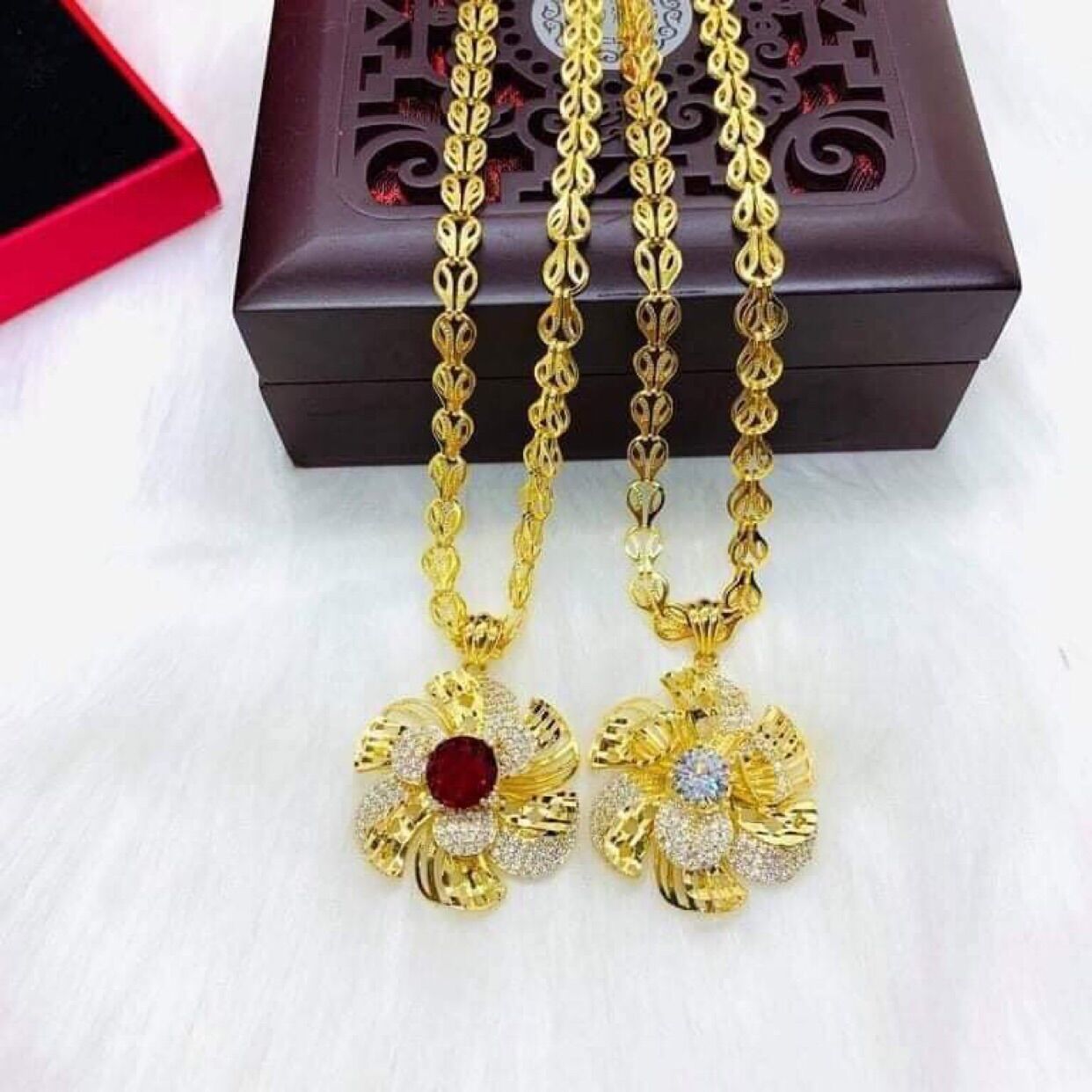 Dây chuyền mạ vàng măt hoa mai