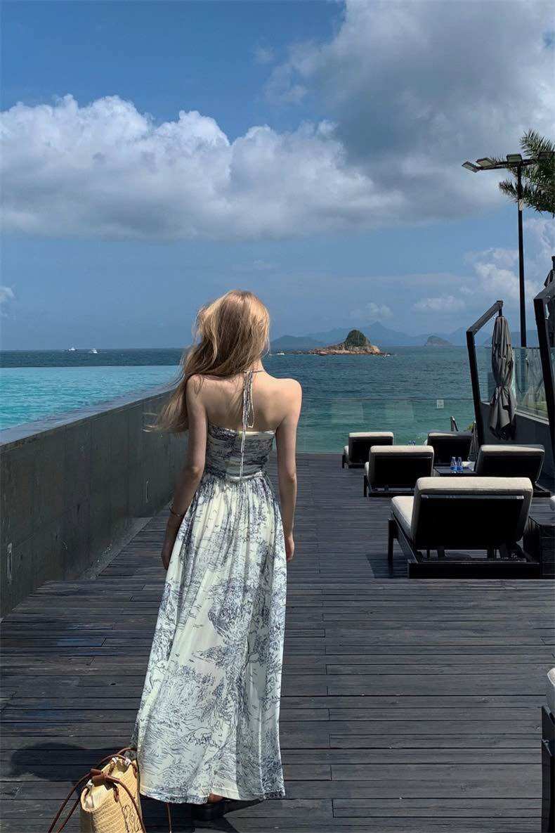Đầm midi xoè yếm hoạ tiết hở lưng