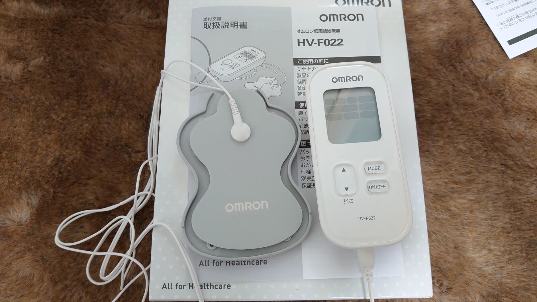 máy trị liệu massage omron