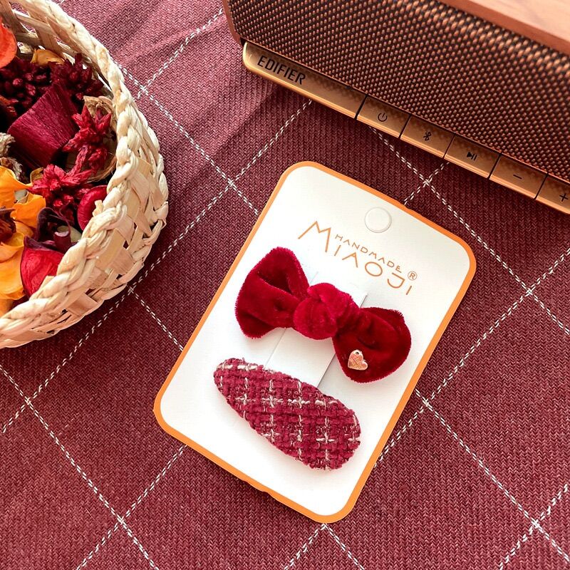 Set kẹp tóc màu đỏ lễ Tết cho bé gái