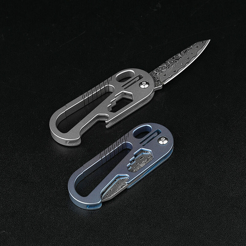 Móc khóa đa năng titanium kèm lưỡi rạch thùng damacus cực đẹp
