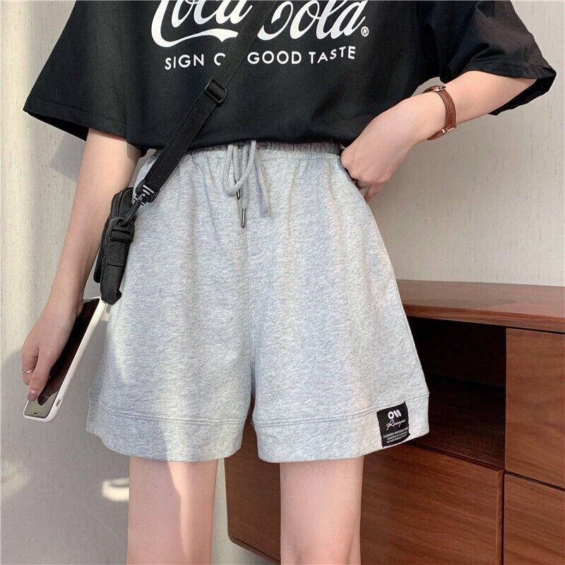 Quần đùi lô gô gấu