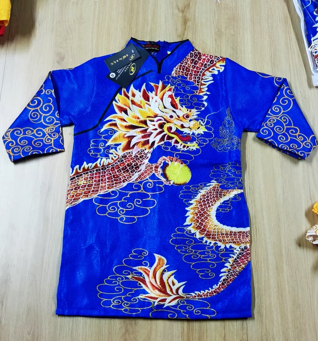 Modernized Ao Dai with Brocade Fabric from Thong Hai
