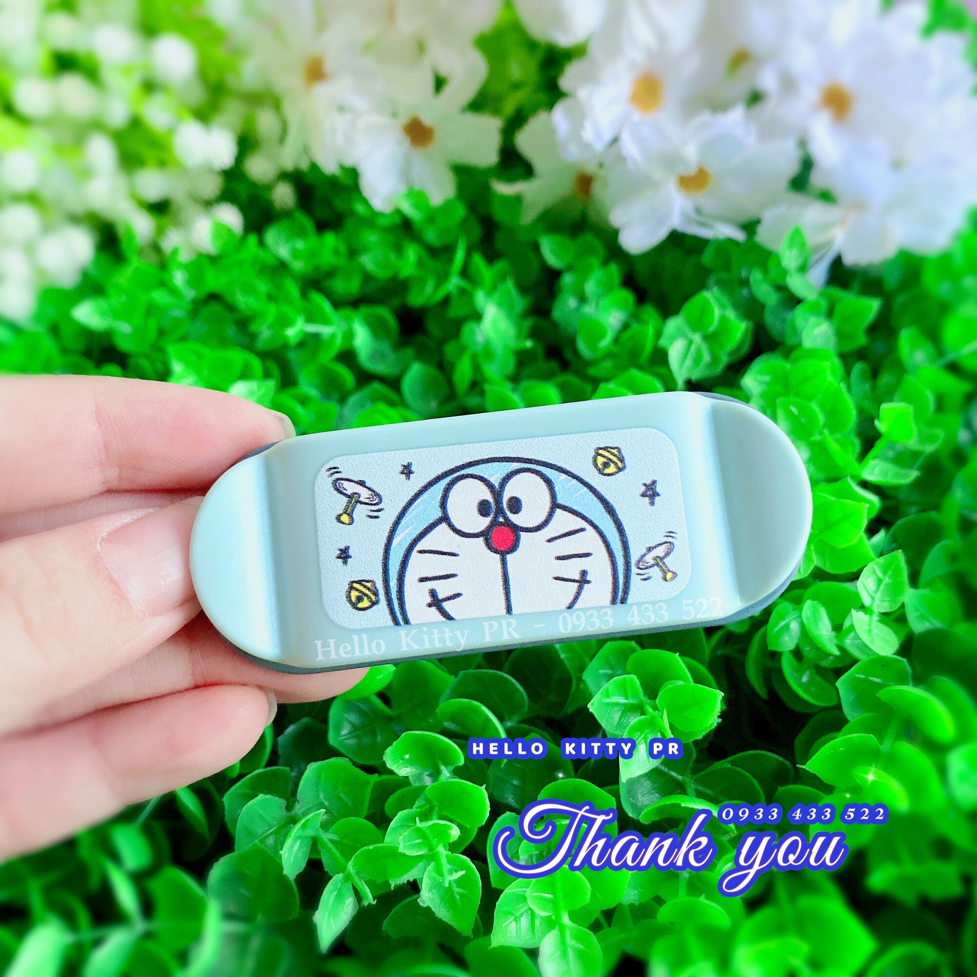 Kẹp giữ phích cắm Hello Kitty - Doremon Doraemon