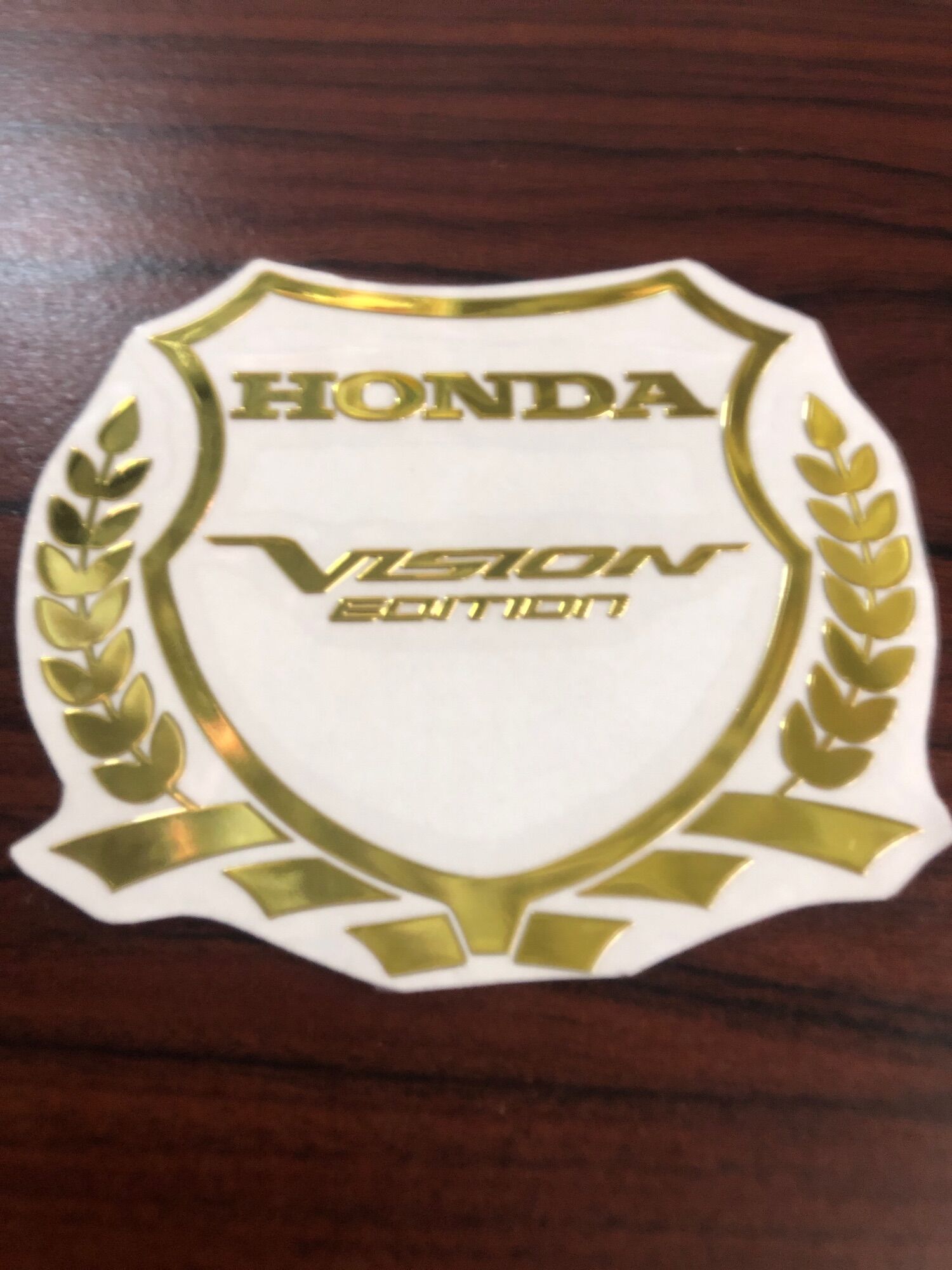 LOGO KẼM HONDA BÔNG LÚA VISION VÀNG