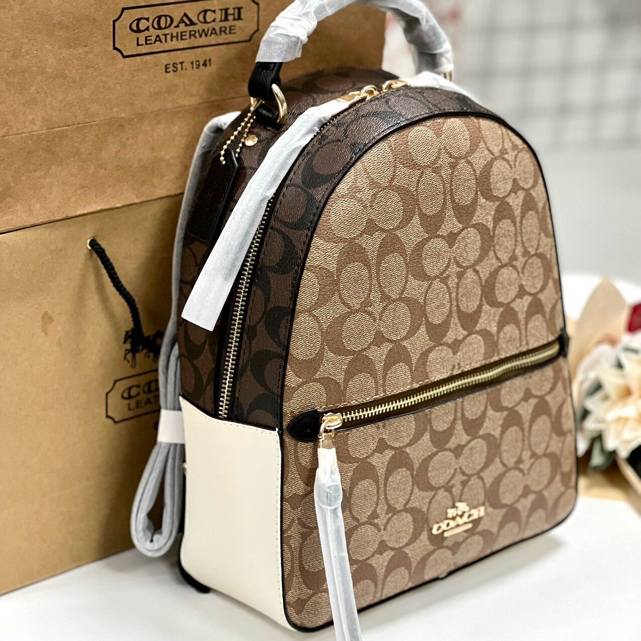Ba lô nữ da thật pha canvas Coach rộng rãi, phối màu trẻ trung