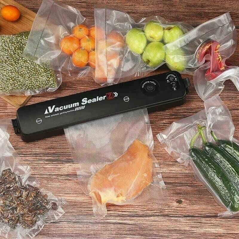 Máy hút chân không thực phẩm kèm 7 túi Vacuum Sealer chính hãng. tiện lợi, hiệu quả, dễ thao tác