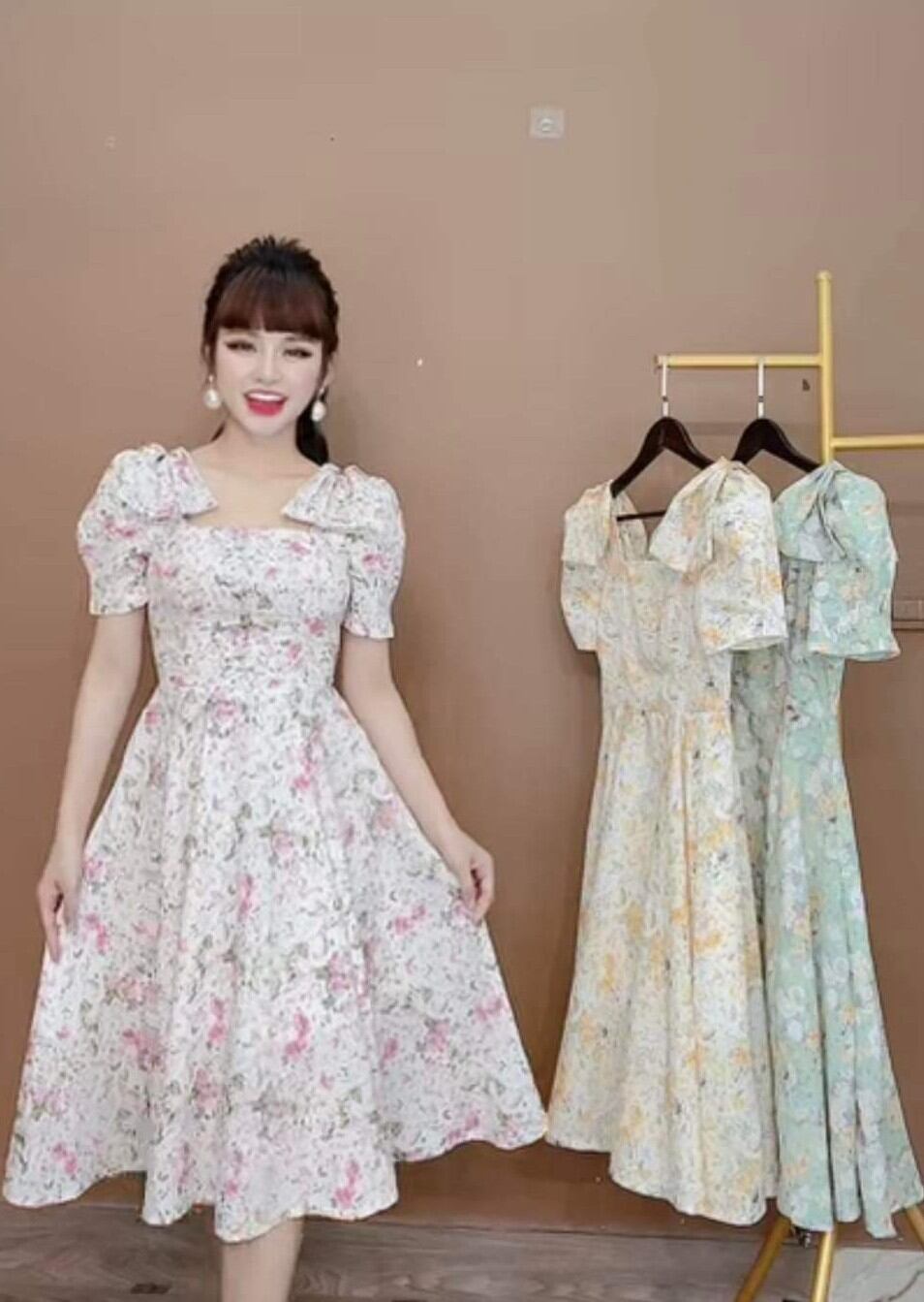Đầm hoa đính nơ 2 vai Monoco