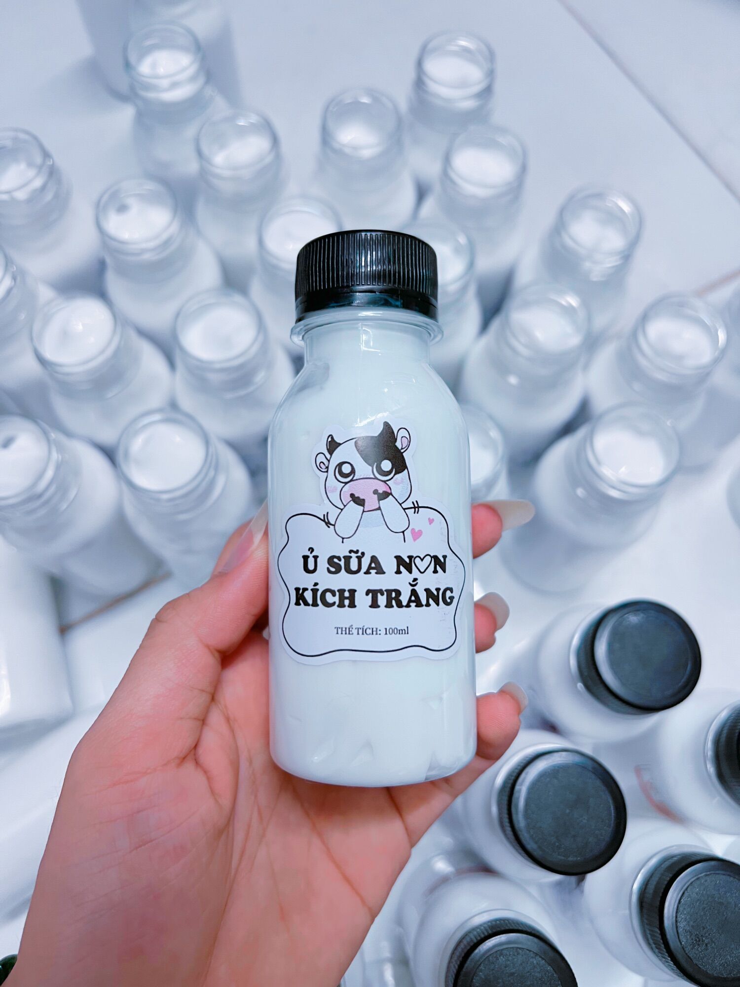 01 chai sữa non ủ kích trắng body 100ml