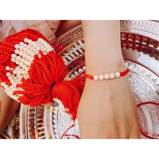 Vòng đỏ hạt trắng thái lan