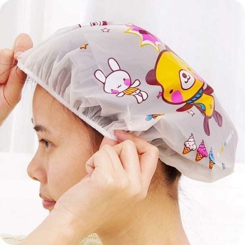 Mục chùm tóc khi tắm - mũ ủ tóc