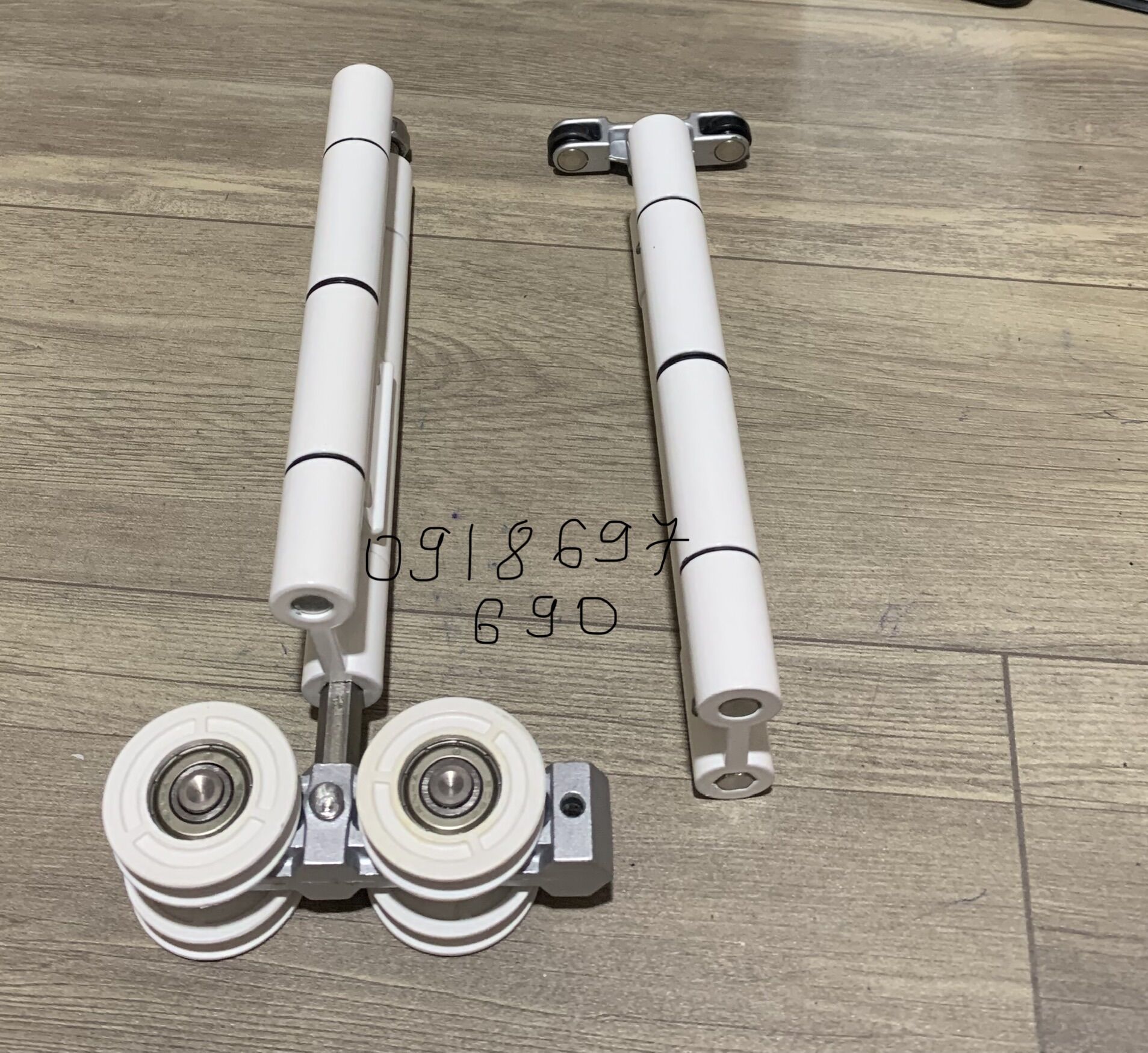 [HCM]Bánh xe cửa lùa xếp trượt nhôm xingfa