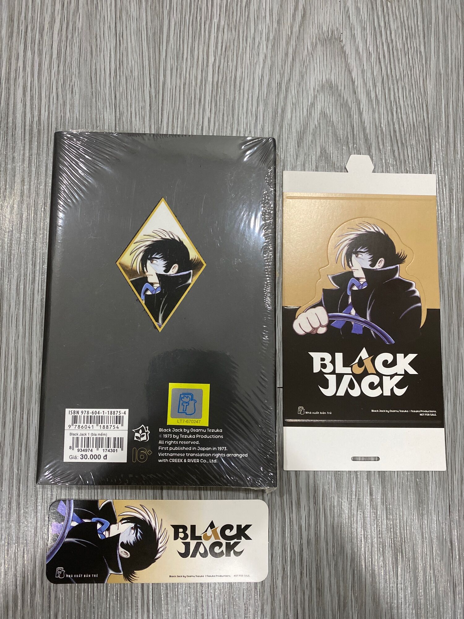Black Jack - Tập 1 - Tặng kèm 1 standee + bookmark ( nguyên seal )