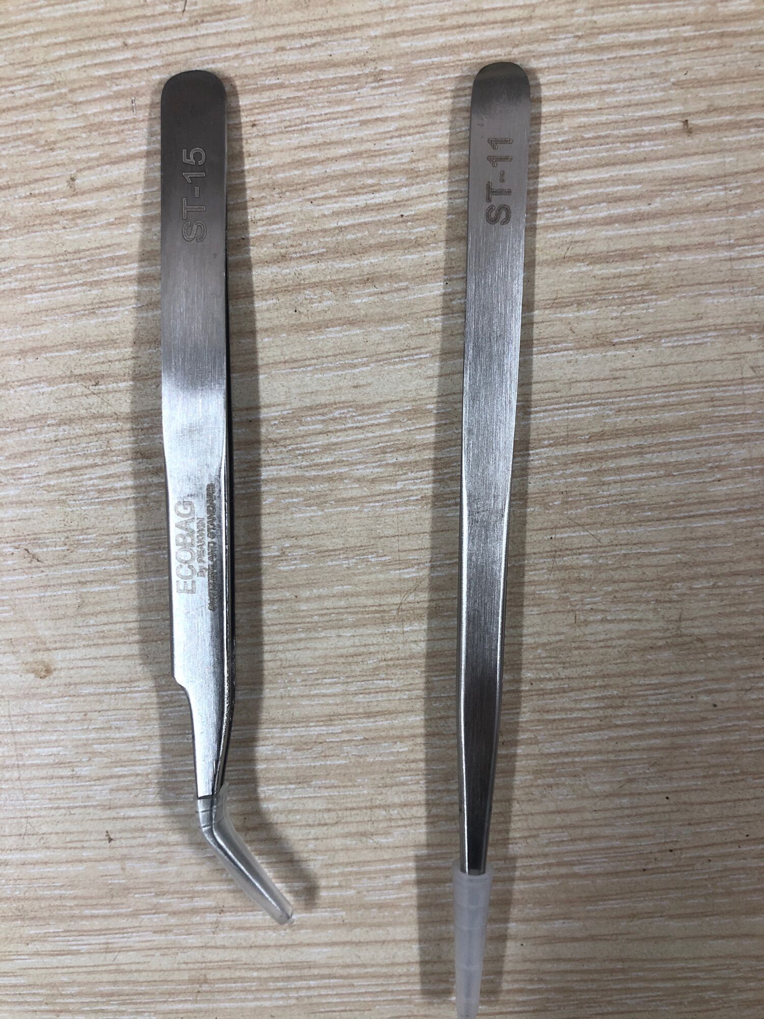 Nhíp nhặt lông Yến 2 cái thẳng cong bằng inox