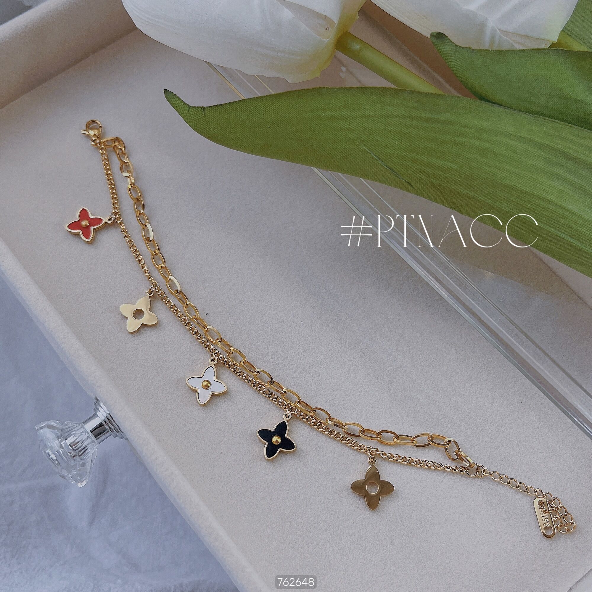 ᴾᵀᴺᵃᶜᶜ lắc tay titan cỏ 4 lá nhiều màu . l55182