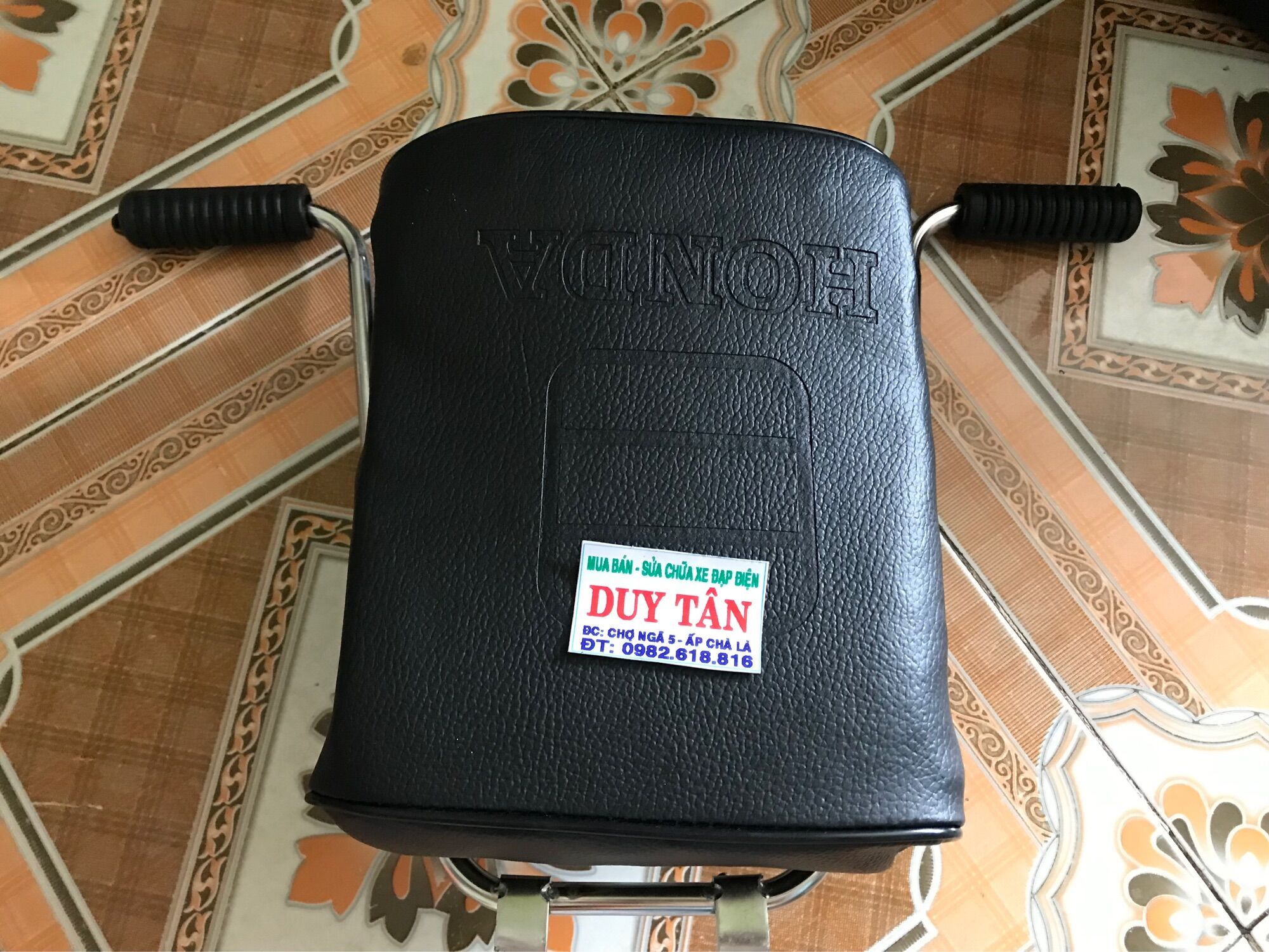 ghế đi xe máy cho bé